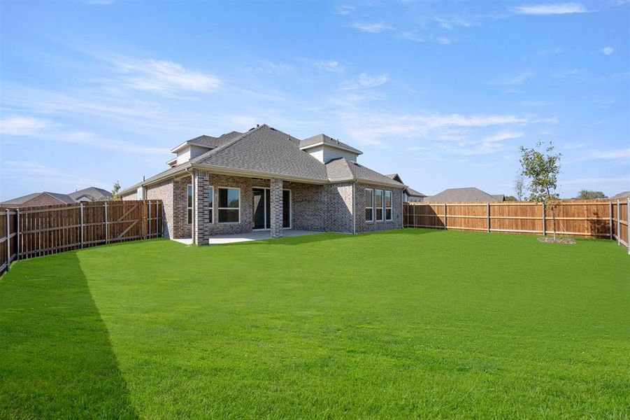 Exterior details and patio area of a home in Oaks of North Grove, Waxahachie (Image 2).