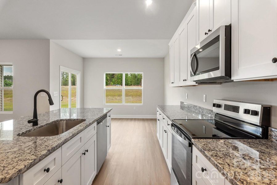 Furnished interior view inside a new home in Ascot Woods, Charlotte (Image 3).