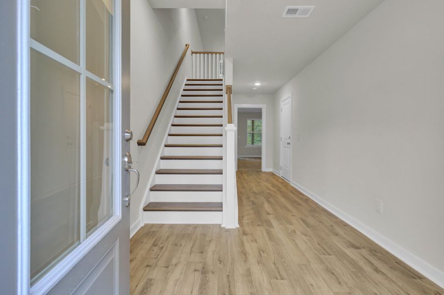 Spacious, unfurnished interior of a new home in Indigo Grove Townhomes, Johns Island (Image 17).