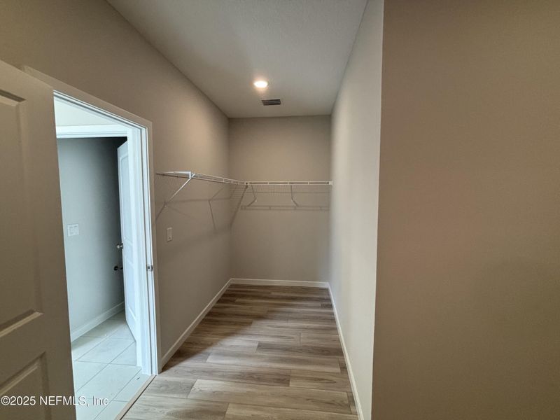 Spacious, unfurnished interior of a new home in The Cypress Series at Reserve East, Flagler Beach (Image 13).