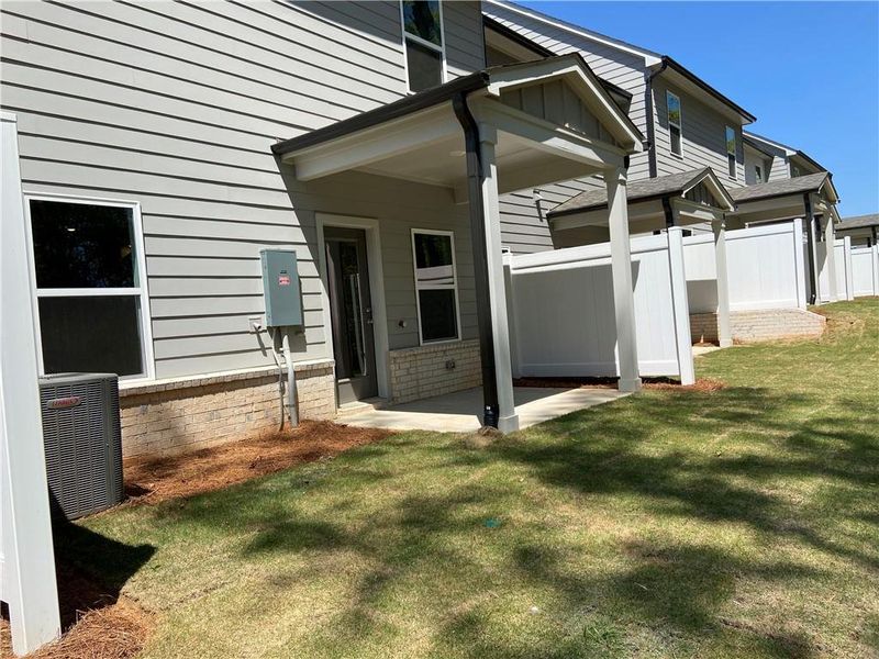 Exterior details and patio area of a home in Eastlyn Crossing, Flowery Branch (Image 3). Exterior details and patio area of a home in Eastlyn Crossing, Flowery Branch (Image 3).