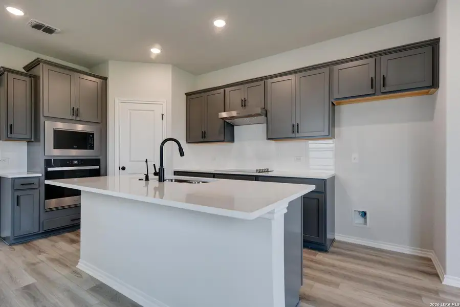 Furnished interior view inside a new home in Hennersby Hollow, San Antonio (Image 8).