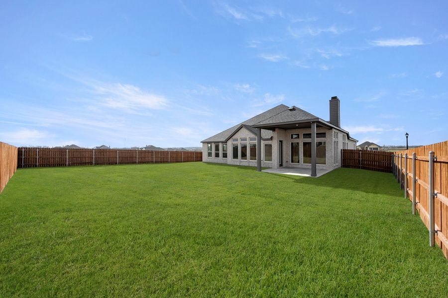 Exterior details and patio area of a home in Bull Hide Estates, Hewitt (Image 27).