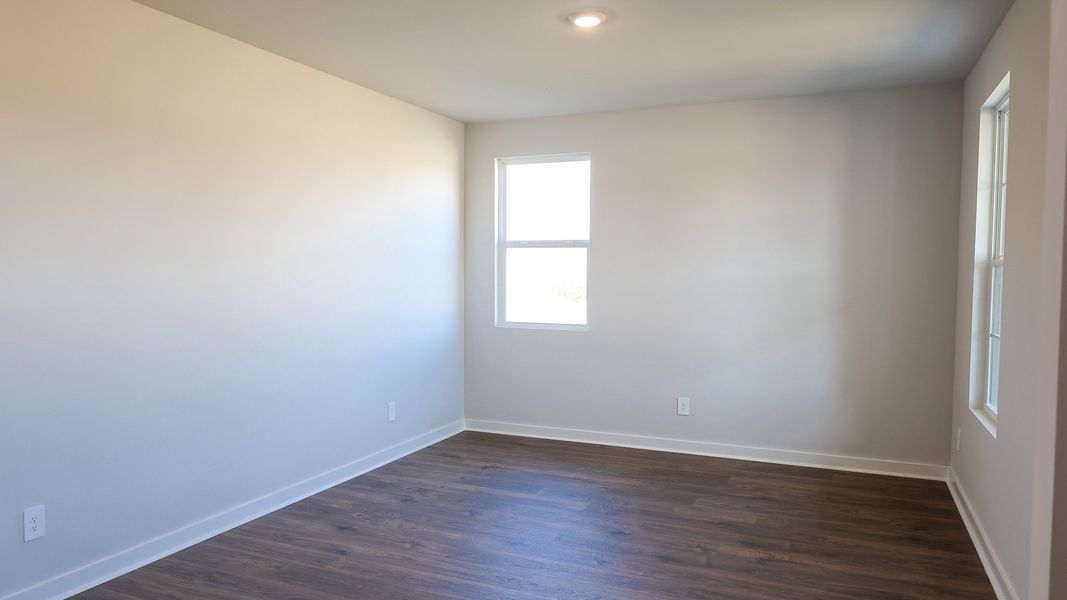 Representative unfurnished interior of a home built from the STONEBROOK II by D.R. Horton in Harvest Point, Spring Hill (Image 27).
