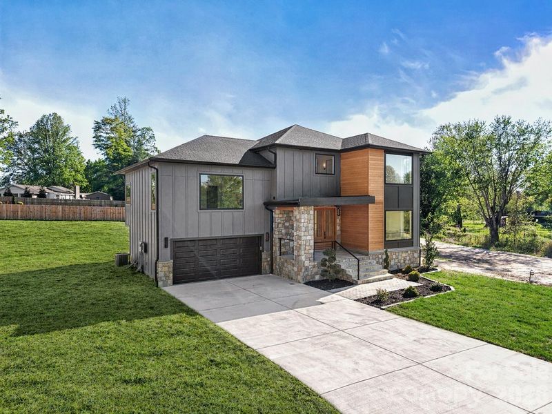 Front exterior of a new home in , Flat Rock, NC, highlighting curb appeal (Image 26).
