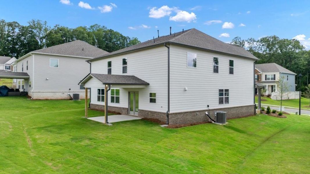 Front exterior of a new home in Butner Estates, College Park, GA, highlighting curb appeal (Image 30).