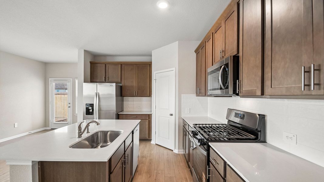 Furnished interior view inside a new home in Carillon, Manor (Image 3).