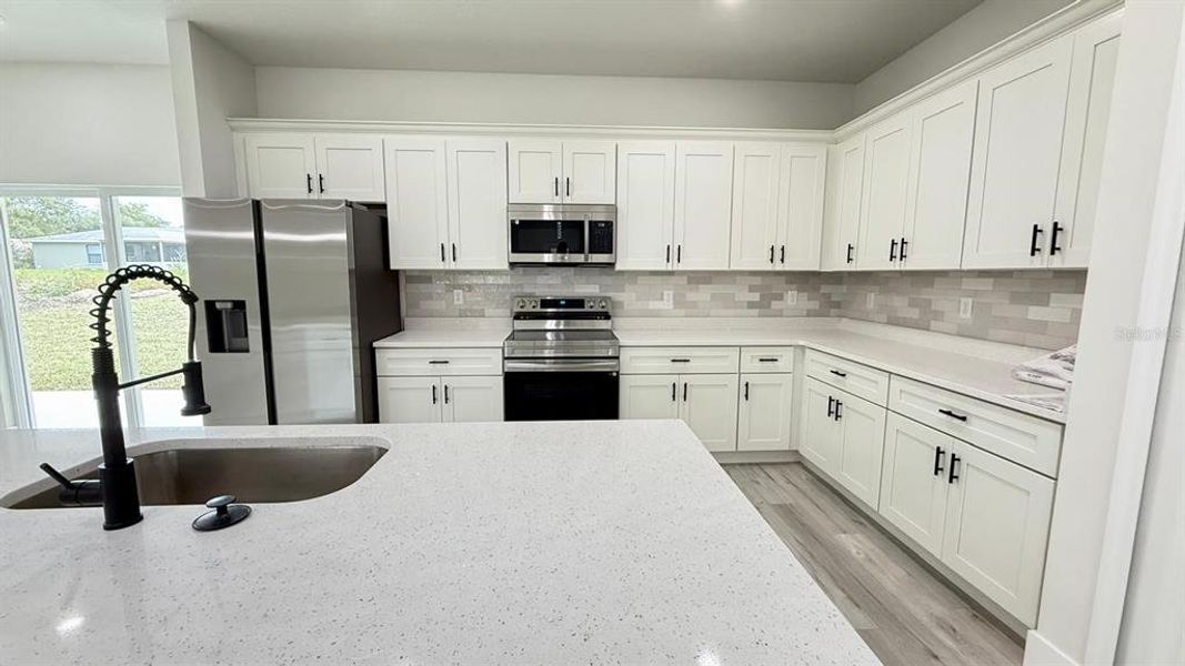 Furnished interior view inside a new home in , Ocala (Image 11).