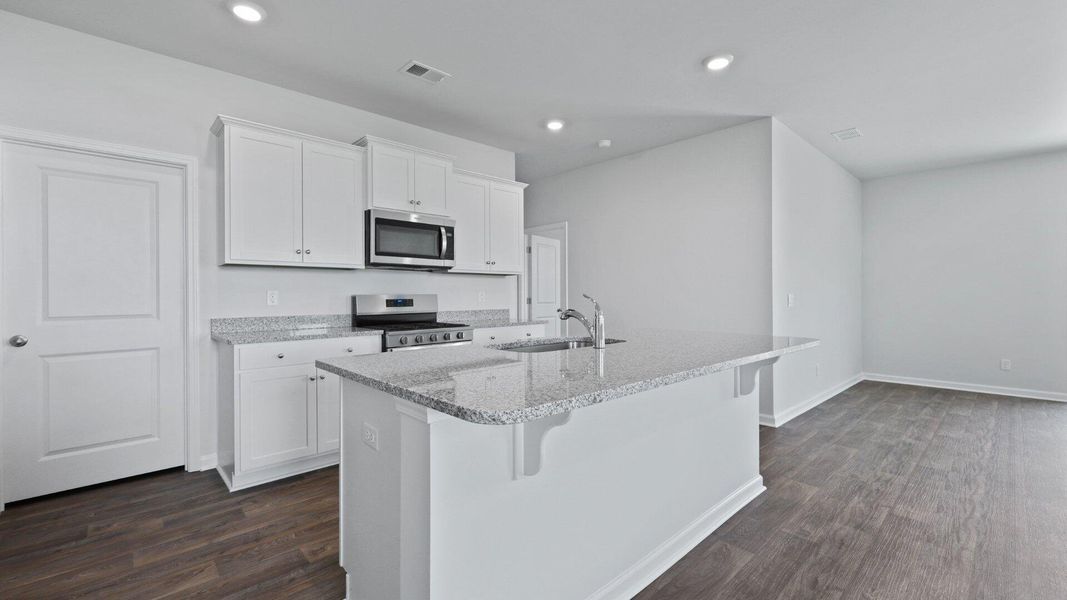 Furnished interior view inside a new home in Pine Hills at Cane Bay, Summerville (Image 7).