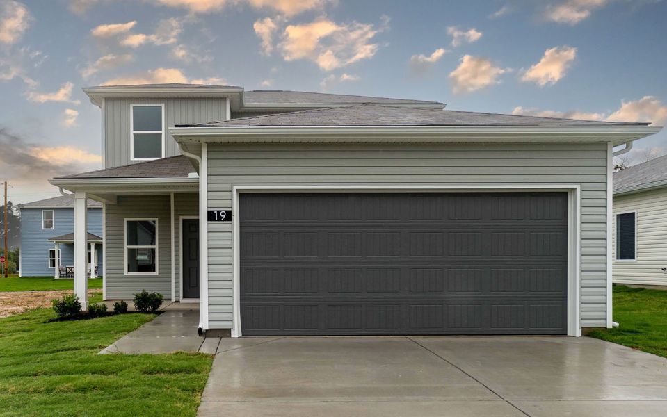 Front exterior of a new home in Stonehenge, Manchester, TN, highlighting curb appeal (Image 2). Front exterior of a new home in Stonehenge, Manchester, TN, highlighting curb appeal (Image 2).