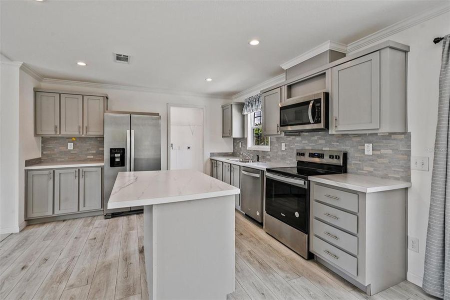 Furnished interior view inside a new home in , North Fort Myers (Image 4).