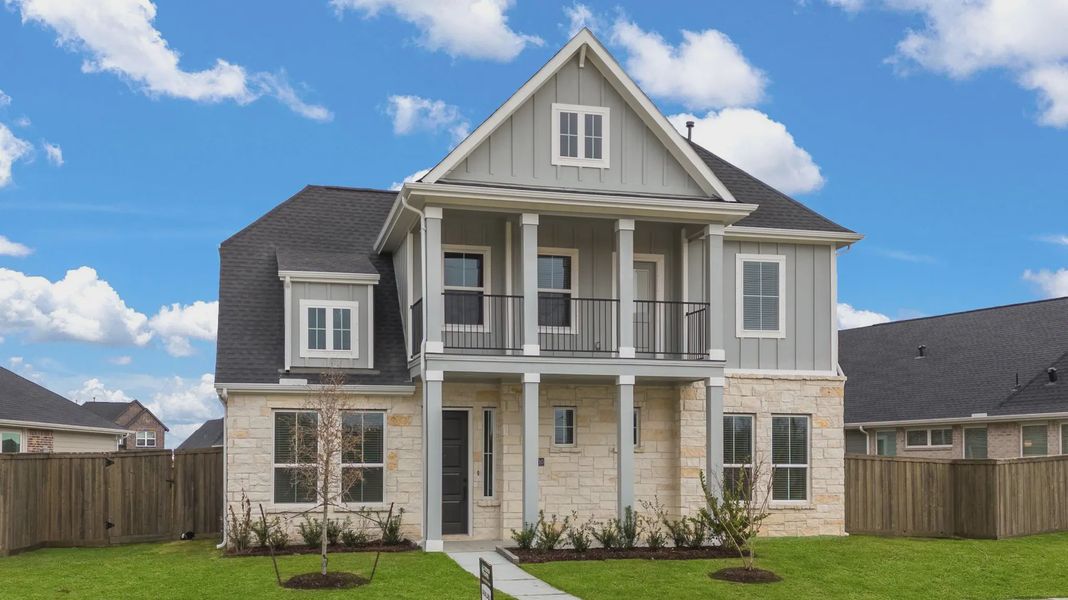 Representative exterior photo of a completed home built from the Sorenstam by Chesmar Homes in Riceland Alley Loads, Mont Belvieu, TX (Image 29).