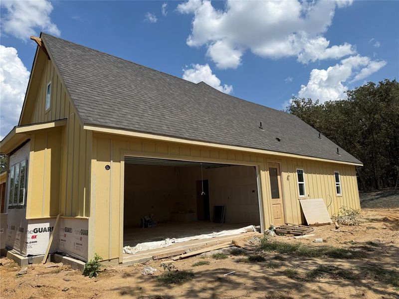 Exterior details and patio area of a home in , Poolville (Image 4).