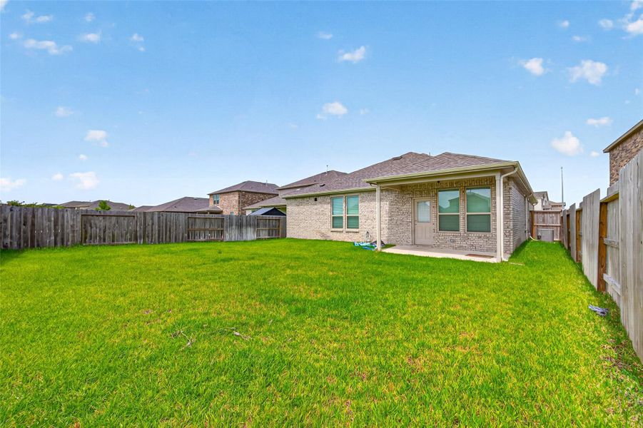 Exterior details and patio area of a home in Marvida, Cypress (Image 4).