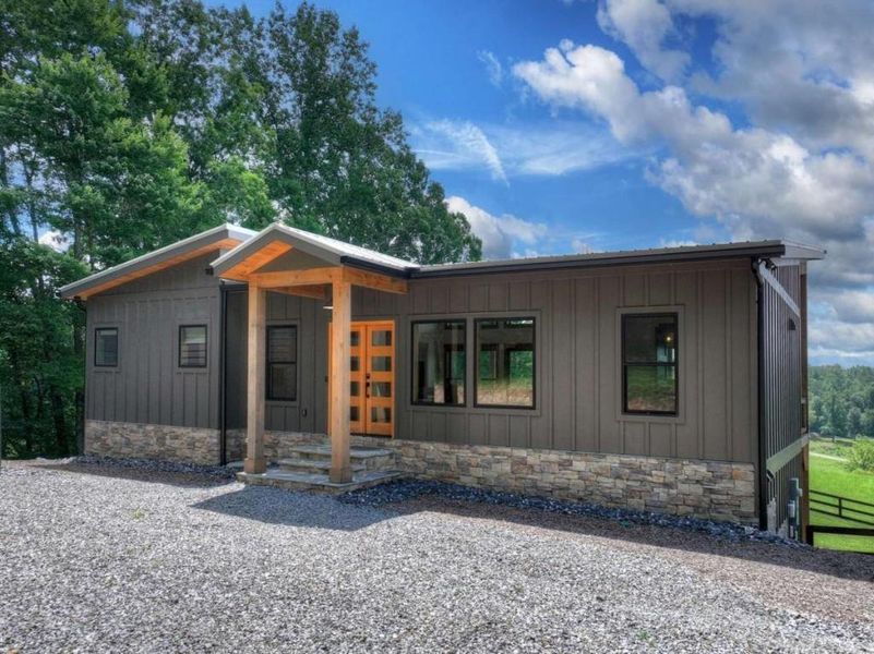 Front exterior of a new home in , Blue Ridge, GA, highlighting curb appeal (Image 1). Front exterior of a new home in , Blue Ridge, GA, highlighting curb appeal (Image 1).