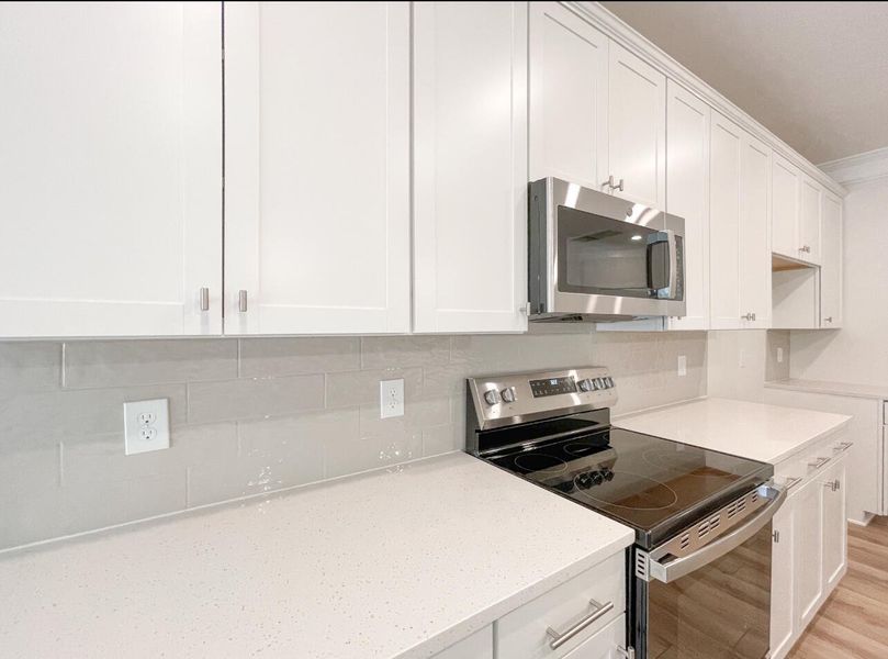 Furnished interior view inside a new home in Attenborough Townhomes, Piedmont (Image 6). Furnished interior view inside a new home in Attenborough Townhomes, Piedmont (Image 6).
