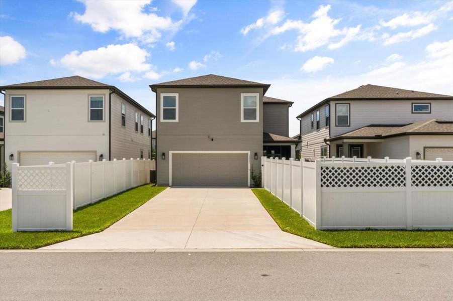 Front exterior of a new home in , Winter Garden, FL, highlighting curb appeal (Image 24). Front exterior of a new home in , Winter Garden, FL, highlighting curb appeal (Image 24).