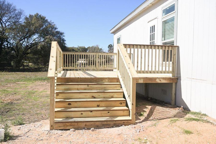 Wooden deck with stairs Wooden deck with stairs