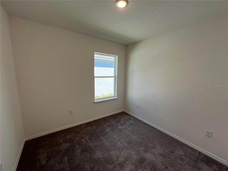 Spacious, unfurnished interior of a new home in Hammock Reserve, Haines City (Image 3).