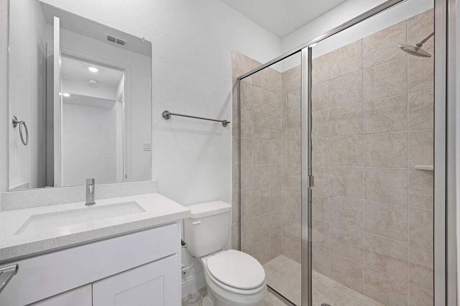 Furnished interior view inside a new home in Highland Lakes, McKinney (Image 9).