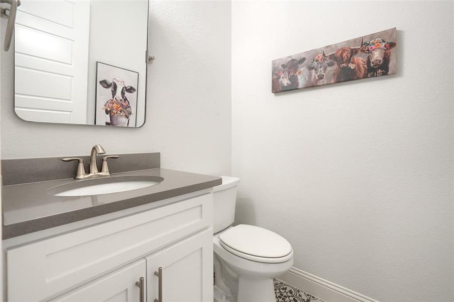 Bathroom with baseboards and vanity