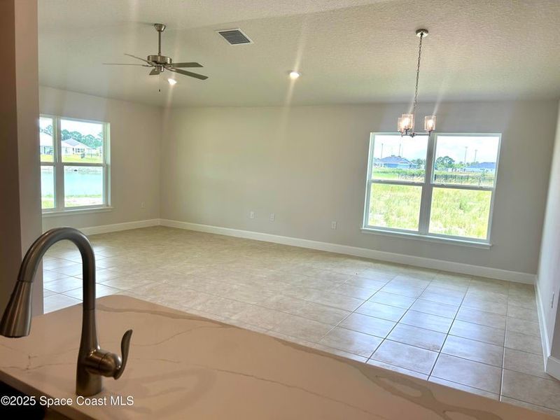 Furnished interior view inside a new home in St. John Preserve, Palm Bay (Image 5).