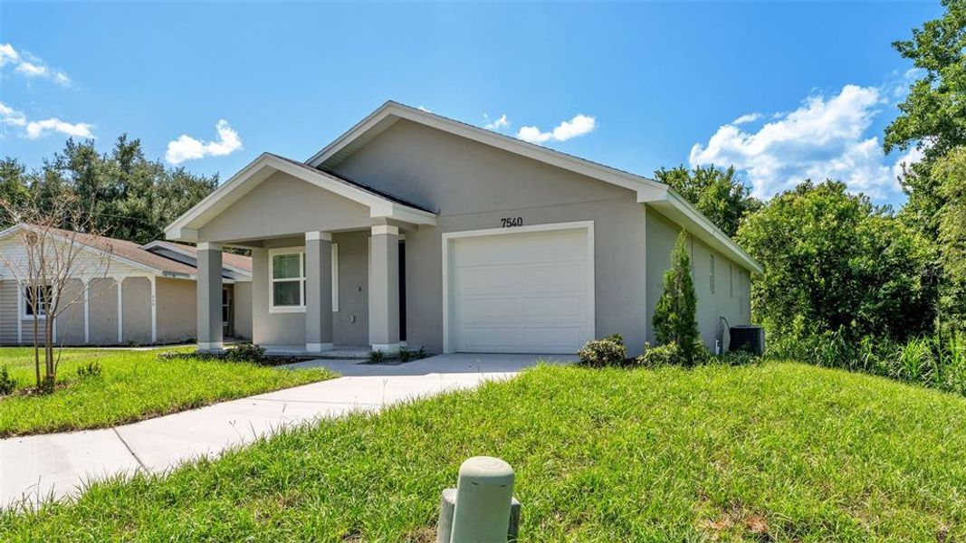 Front exterior of a new home in , Lakeland, FL, highlighting curb appeal (Image 20). Front exterior of a new home in , Lakeland, FL, highlighting curb appeal (Image 20).
