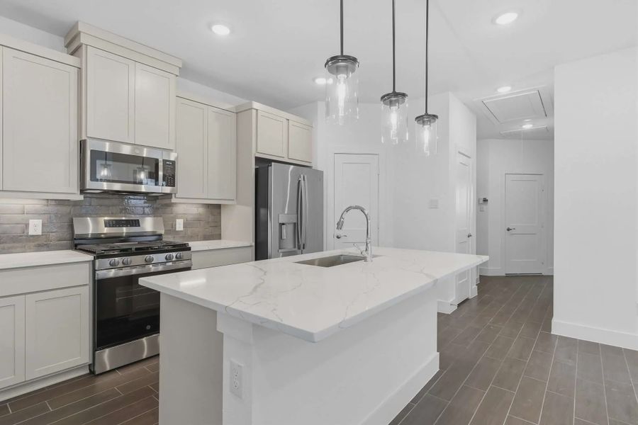 Representative furnished interior of a home built from the Carriagehouse by Chesmar Homes in Meridiana Townhomes, Iowa Colony (Image 61).