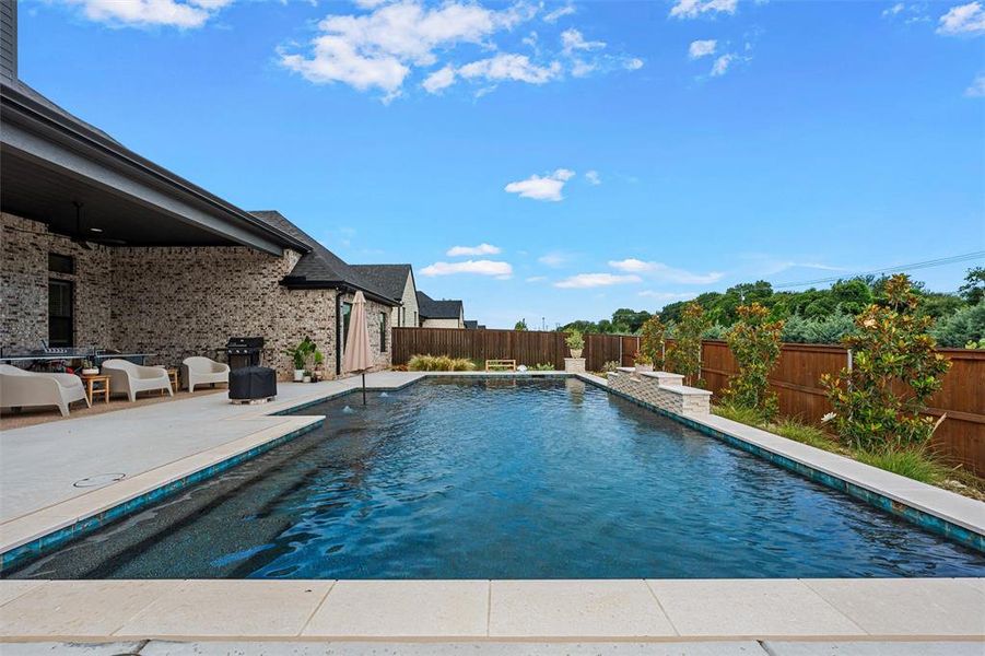 Exterior details and patio area of a home in , Woodway (Image 4).