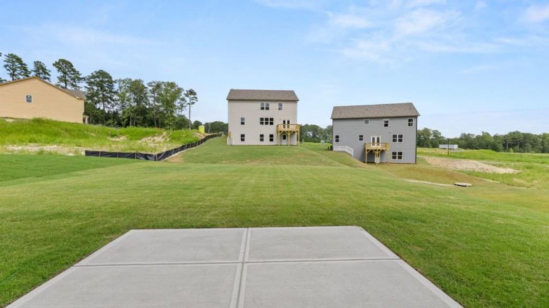 Exterior details and patio area of a home in Northwoods at Mirror Lake, Villa Rica (Image 3).