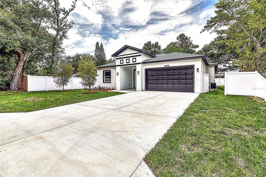 Front exterior of a new home in , Clearwater, FL, highlighting curb appeal (Image 27). Front exterior of a new home in , Clearwater, FL, highlighting curb appeal (Image 27).