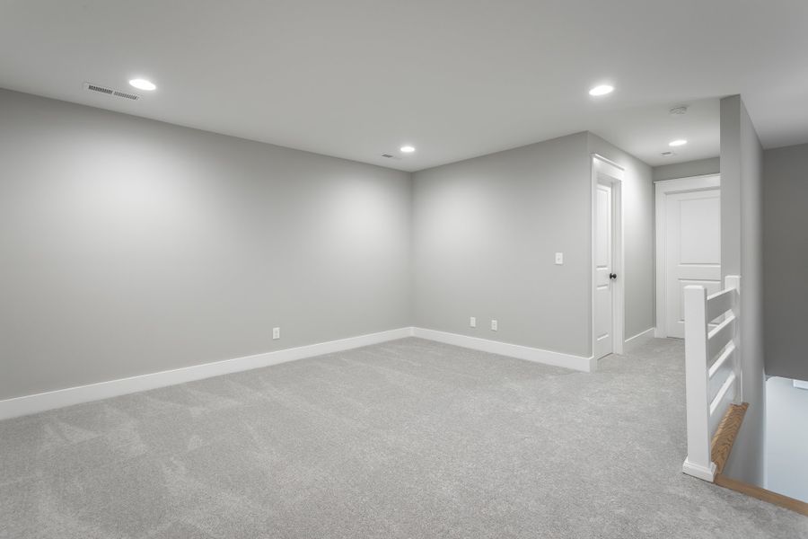 Spacious, unfurnished interior of a new home in Baker Road, Birchwood (Image 30).