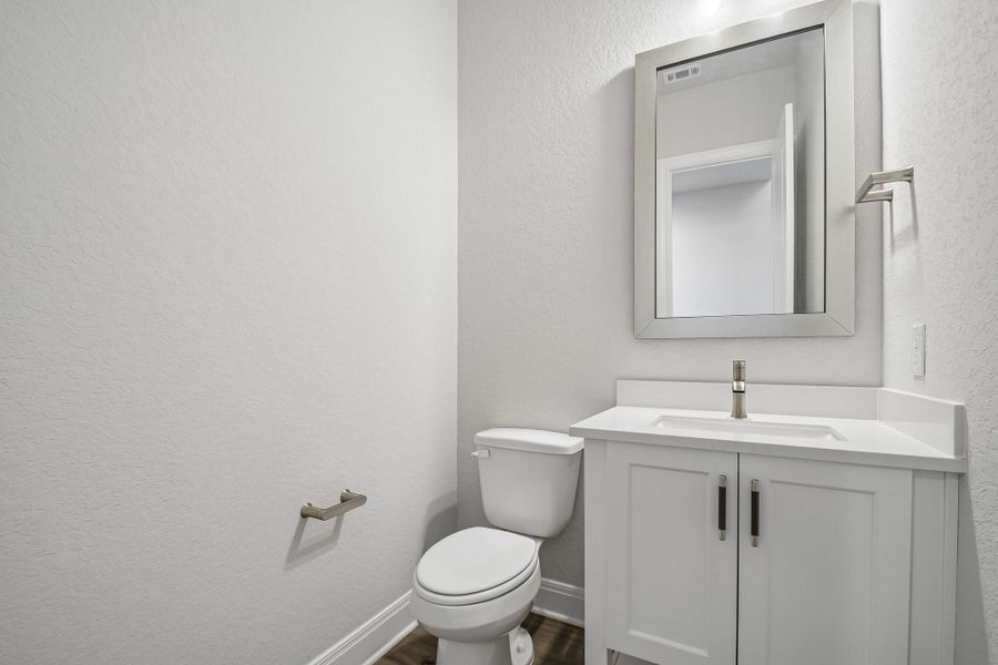 Furnished interior view inside a new home in 6 Creeks, Kyle (Image 12).