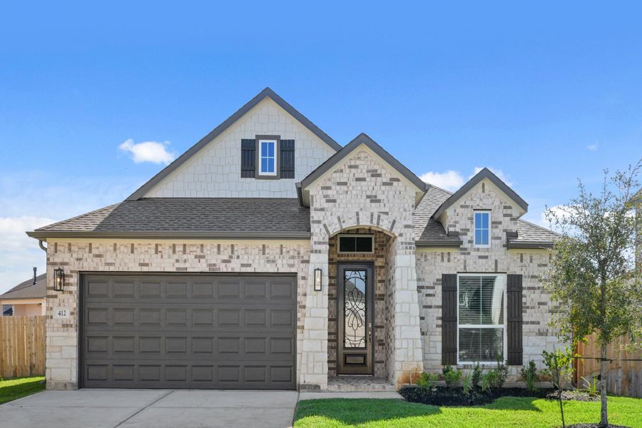 Front exterior of a new home in Beacon Hill, Waller, TX, highlighting curb appeal (Image 1). Front exterior of a new home in Beacon Hill, Waller, TX, highlighting curb appeal (Image 1).