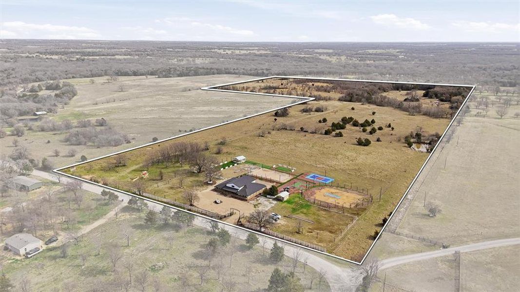 Outlined, aerial view of property.