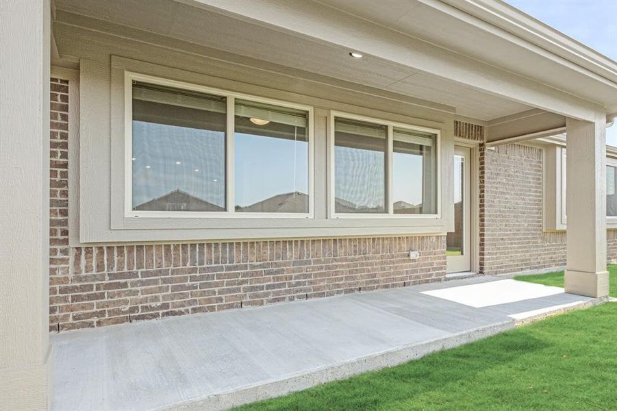 Exterior details and patio area of a home in Eagle Glen Elements, Alvarado (Image 4). Exterior details and patio area of a home in Eagle Glen Elements, Alvarado (Image 4).