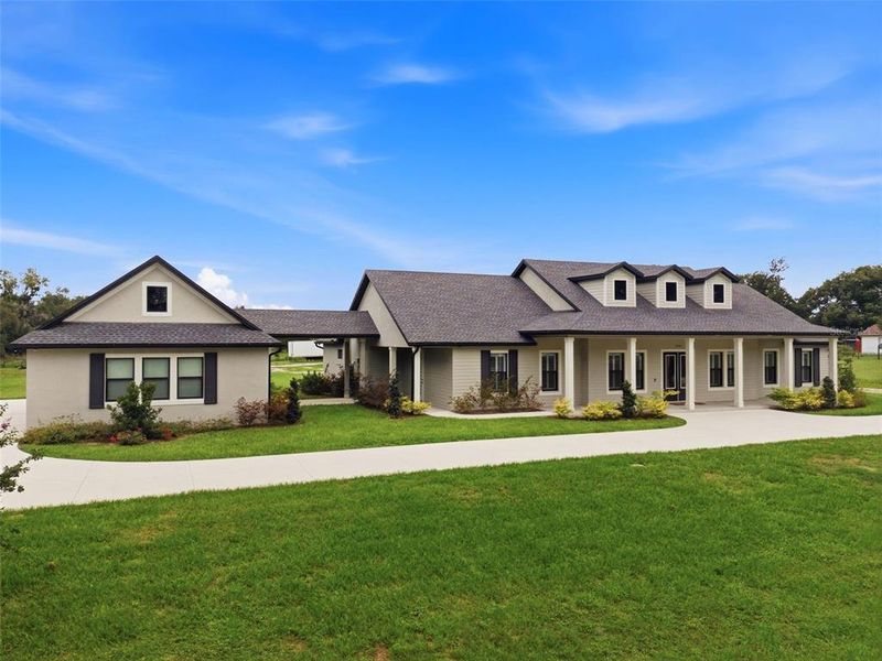 Front exterior of a new home in , Dade City, FL, highlighting curb appeal (Image 26). Front exterior of a new home in , Dade City, FL, highlighting curb appeal (Image 26).