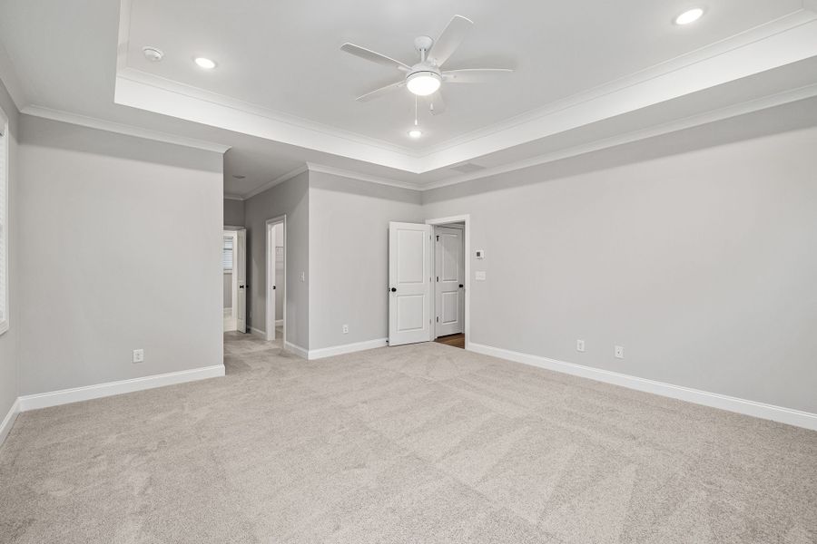 The primary bedroom includes dual closets and a spacious bathroom