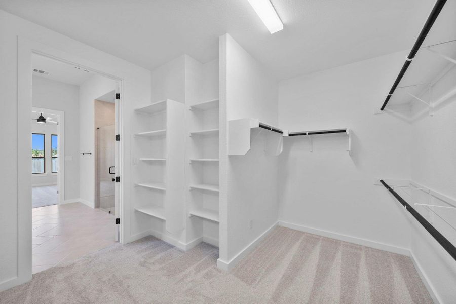 Walk-in closet in Primary Bedroom