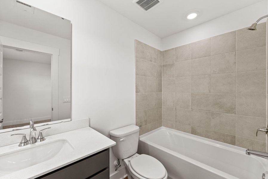 Furnished interior view inside a new home in The Coves at Lakes of Cane Bay, Summerville (Image 19). Furnished interior view inside a new home in The Coves at Lakes of Cane Bay, Summerville (Image 19).