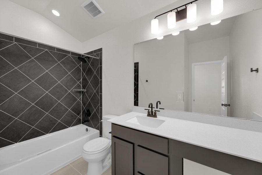 Furnished interior view inside a new home in Salerno - Classic Collection, Round Rock (Image 14). Furnished interior view inside a new home in Salerno - Classic Collection, Round Rock (Image 14).