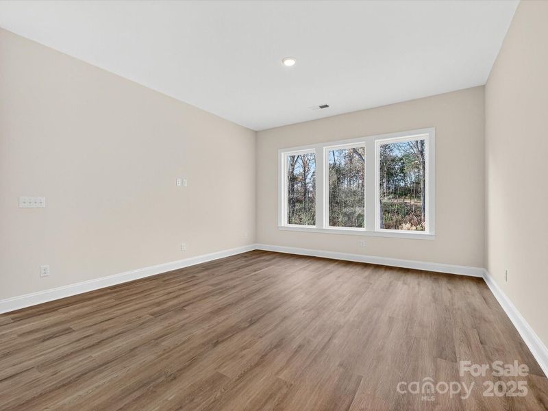 Spacious, unfurnished interior of a new home in North Creek Village, Huntersville (Image 34).