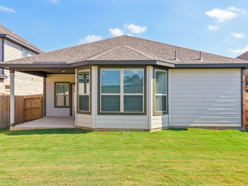 Exterior details and patio area of a home in Kallison Ranch, San Antonio (Image 19).