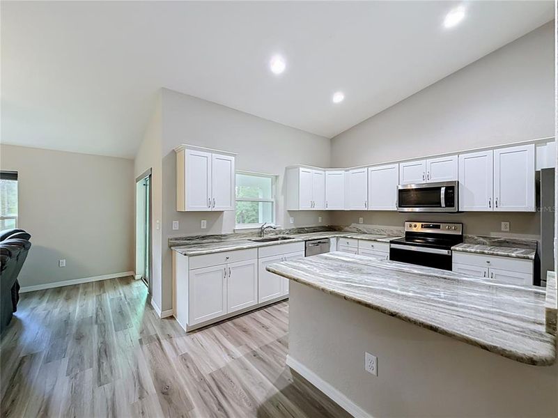 Furnished interior view inside a new home in , Dunnellon (Image 38).