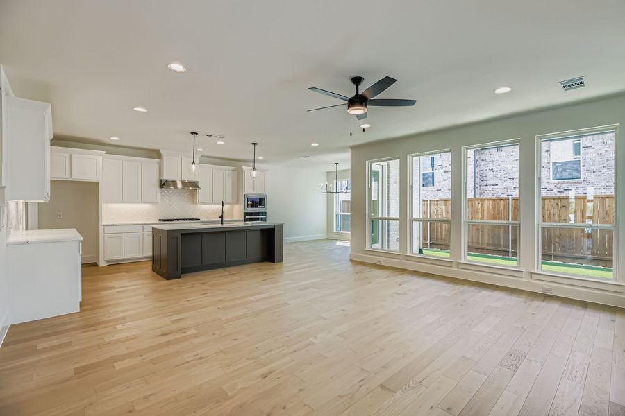 Furnished interior view inside a new home in Castle Hills Northpointe - Townhomes, Lewisville (Image 5).