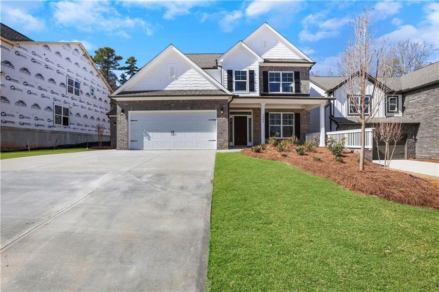 Exterior details and patio area of a home in Cambridge, Flowery Branch (Image 2).