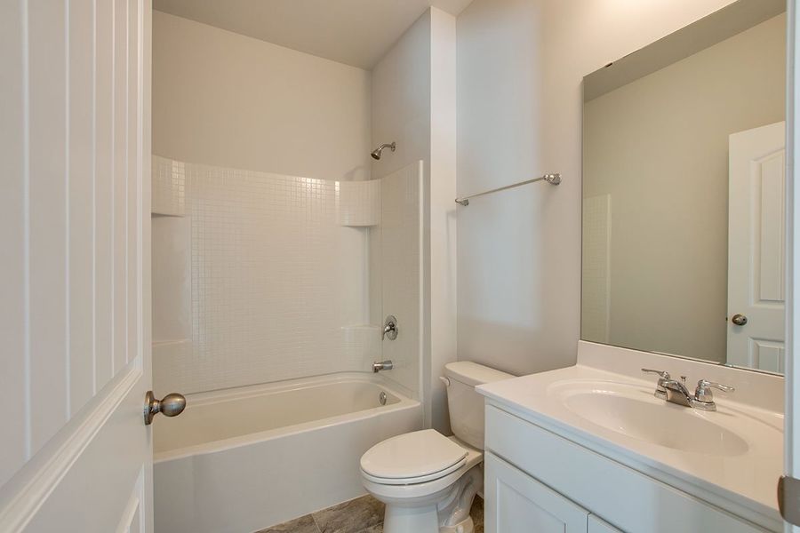 Representative furnished interior of a home built from the HAYDEN by D.R. Horton in The Parks, White House (Image 7).