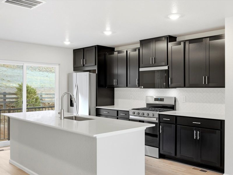 Furnished interior view inside a new home in Three Hills, Morrison (Image 3).