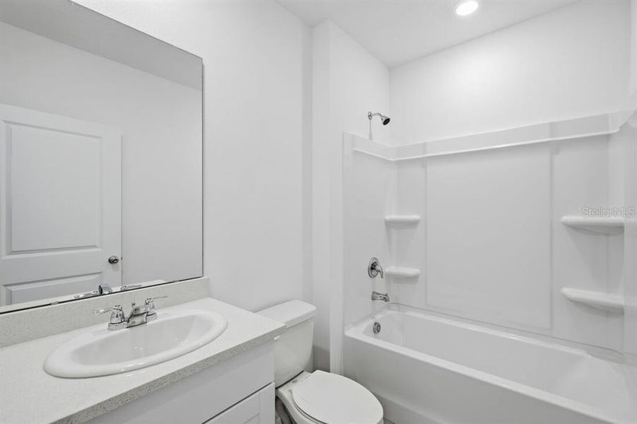 Furnished interior view inside a new home in Waterstone, Groveland (Image 8).