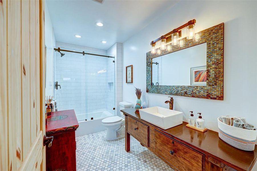 Stunningly appointed guest bath serves 2 secondary bedrooms.94 San Saba St Austin TX 78702 MLS# 7207900